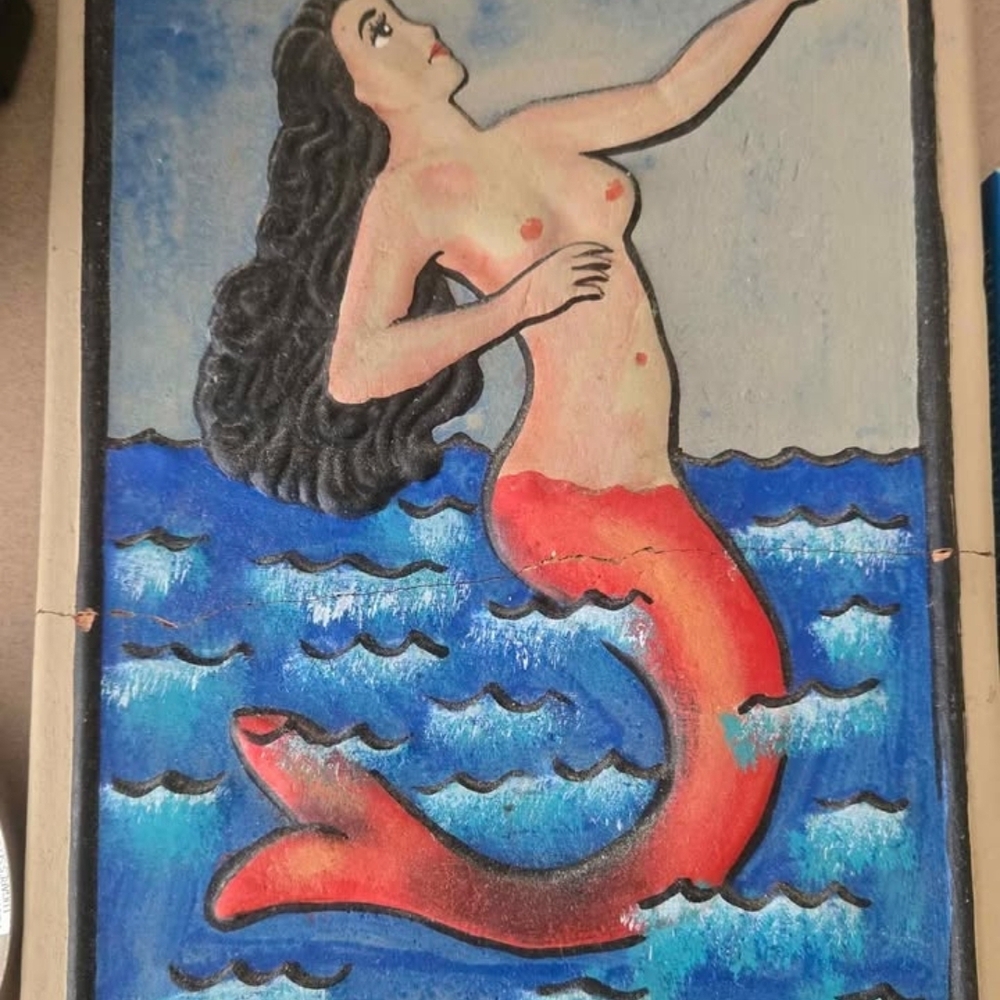 Enchanting Mermaid Art with Red and Blue Waves
